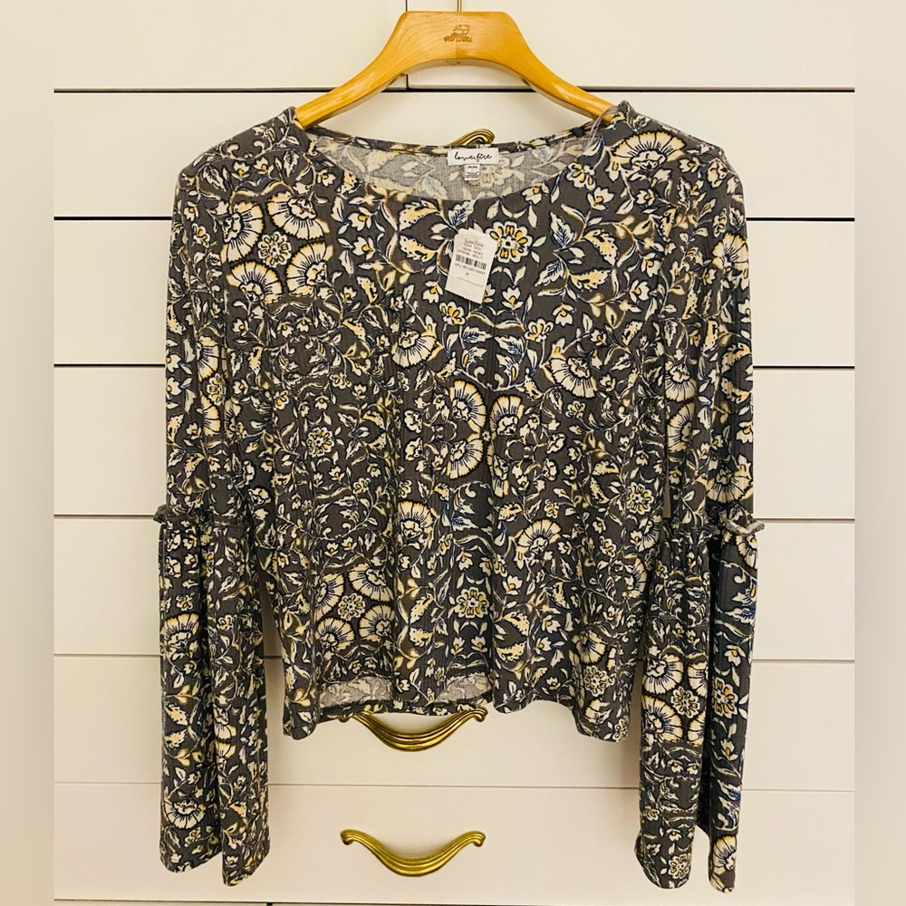 Brand new with tags love,fire Maxi shirt from Neiman Marcus so cute with jeans.